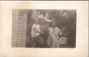 RPPC Darling Family Older Man and Woman with Child Real Photo Postcard W18
