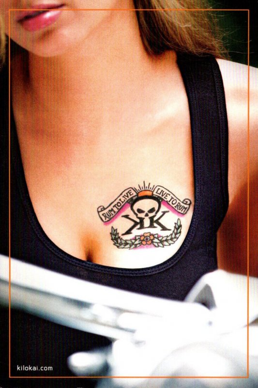 Advertising Kilo Kai Spiced Rum Tatoo On Girl's Chest