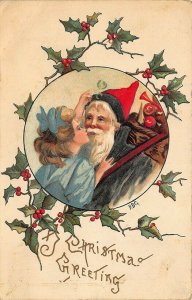 Christmas Greetings Green Suit Santa Claus Girl Giving A Kiss Embossed Postcard