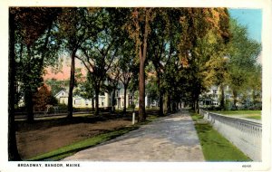 Bangor, Maine - Looking down tree-lined Broadway - c1920