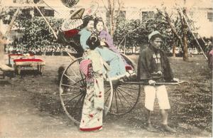 Chromolithograph Postcard Geishas Pulled in a Rickshaw Hand Colored