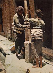 BR28221 Women making bitten rice traditionaly folklore