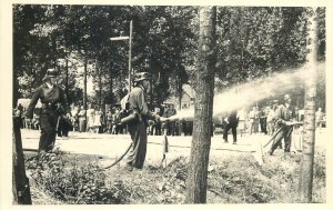 Postcard germany grouven feuerwehr fire bridade firemen drill pump 1963 rppc