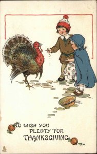 Tuck Thanksgiving Children Kids Feed Turkey c1910 Vintage Postcard