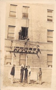 J43/ Interesting RPPC Postcard c1910 Furniture Movers Window Heist Up 33