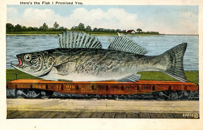 Exaggeration - Here's the Fish (Giant fish on railroad car)