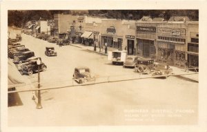 H21/ Paonia Colorado RPPC Postcard c40s Business Stores Autos Gas Station