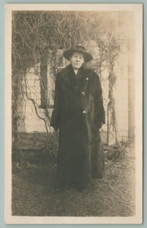 RPPC Norah w/Ribboned Round Hat and Winter Fur Coat~Stands by Grape Vine~c1910 