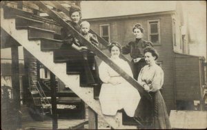 Women Sitting on Steps +Photography Amateur c1910 Real Photo Postcard