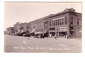 Real Photo, East Side Main Street, Stores, Cars, Redfield, South Dakota