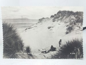 Family Relaxing amongst Sandhills on the Beach Tal Y Bont Wales Vintage Postcard