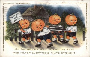 Halloween JOL Head Children Steal Fence c1915 Whitney Postcard