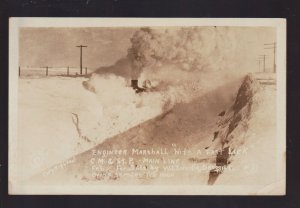 McLaughlin SOUTH DAKOTA RPPC c1910 TRAIN RAMMING SNOW DRIFT Blizzard CM&StP RR 1