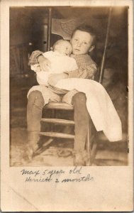 Young Boy Holding Baby Vintage Real Photo Postcard Standard View Card 