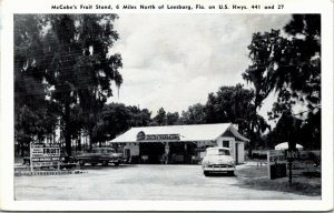 Postcard FL Leesburg McCabe's Fruit Stand Routes 441 & 27 Classic Cars 1950s S43