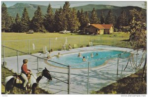 The Heated swimming pool,  Rafter Six Guest Ranch,  Seebe,  Alberta,  Canada,...