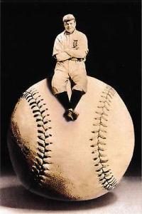 Baseball Player Sitting on Giant Baseball Exaggeration Re...