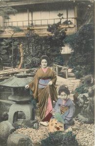 Postcard C-1910 Japan hand colored ethnic dress woman garden 23-13359