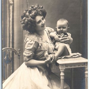 c1910s European Mother & Baby Boy RPPC Creepy Smile Steampunk Photo A148