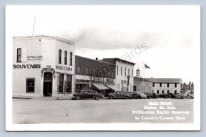 K5/ Custer South Dakota Postcard RPPC c40-50s Main Street Stores Autos 349