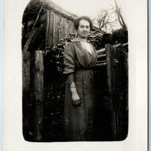 c1910s Balding Lady Outdoors RPPC Lovely Woman Rustic Home House Fence Card A212