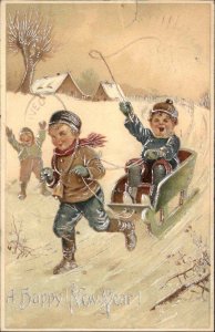 New Year Little Boys Sledding Embossed c1910 Vintage Postcard