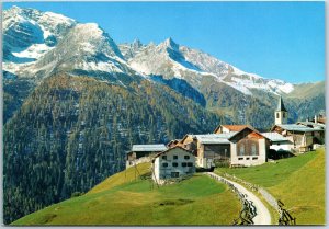 VINTAGE POSTCARD CONTINENTAL SIZE MOUNTAIN SCENE IN WINTER GRISONS SWITZERLAND