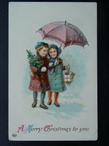 A MERRY CHRISTMAS TO YOU Children with Gifts in Snow c1908 Embossed Postcard