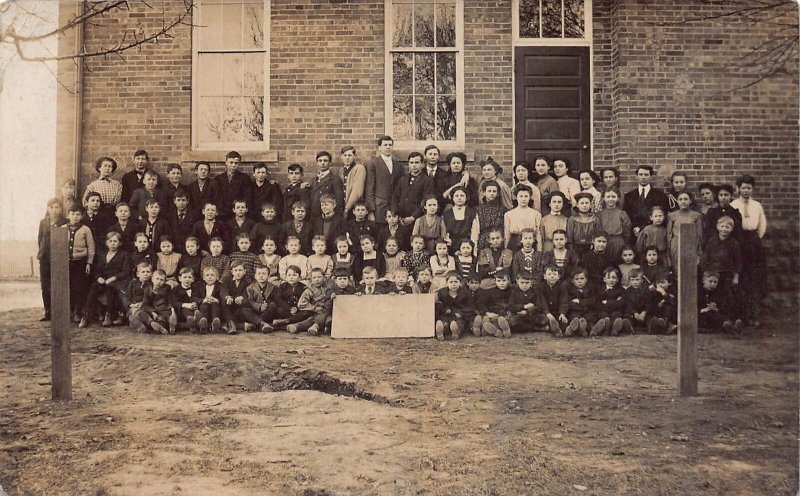 J86/ Louisville Ohio RPPC Postcard c1910 School Building Students Teacher 34