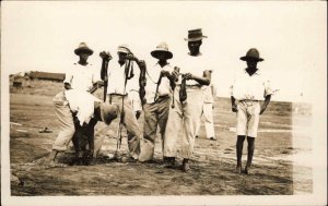 Africa? Black Men & Boys w/ Giant Worms or Snakes? Real Photo Postcard