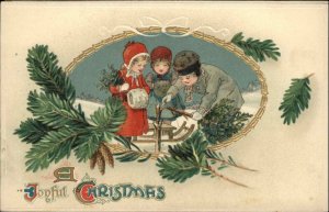 Christmas Children Cut Tree Sled Gilt Embossed BB London c1900s-20s Postcard
