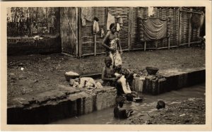 PC CPA real photo washing clothes in the canal INDONESIA (a15231)