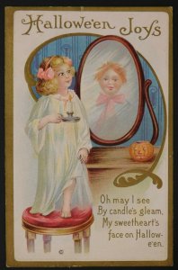 1910s Halloween Postcard Little Girl Casting Spell in Mirror Jack-O'-Lantern