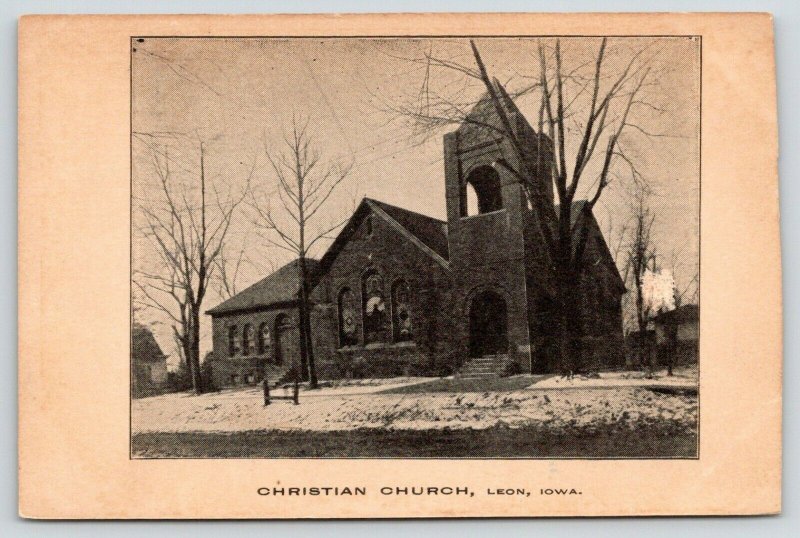 Leon Iowa~Christian Church in Snow~Homes Behind~1907 Sepia Postcard 