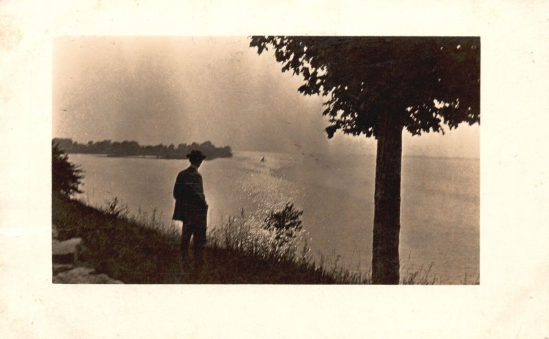 Vintage Postcard 1911 Man Standing Near the Lake Big Tree Grassy Sorroundings