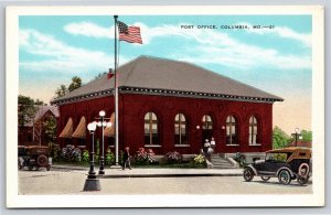 Columbia Missouri~Post Office Bldg Street View~US Flag~EC Kropp~Vintage Postcard