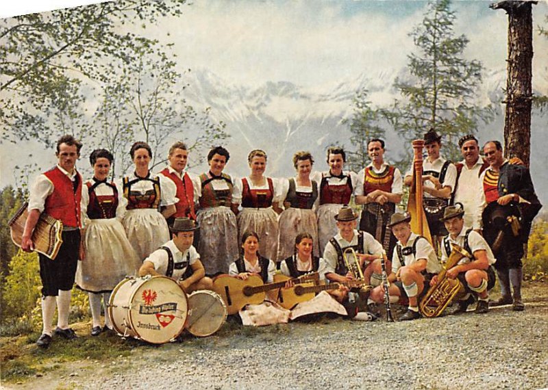 Musicians with Instruments dressed in German attire Tiroler Abend Music Relat...