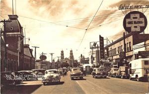 Juarez Chib. Mexico Street View Store Fronts Old Cars Bus RPPC Postcard 