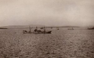 RPPC German Navy Destroyers Sinking Battleships in Distance WWI Postcard