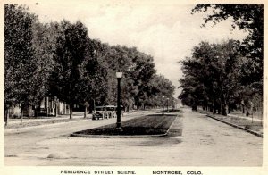 Montrose, Colorado - A residence street scene - c1920