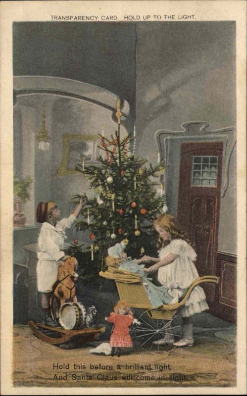 Christmas Hold to Light Santa Claus Appears Right of Children Postcard EXC COND