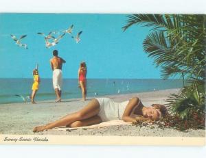Pre-1980 RISQUE - FEED PIGEONS BEHIND SLEEPING BEACH GIRL State Of Florida d7016