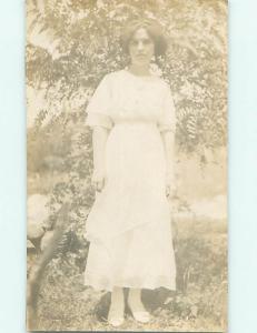 Pre-1918 rppc PRETTY GIRL IN LONG WHITE DRESS BY A TREE r5848