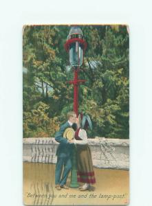 Bamforth comic COUPLE KISSING UNDER ANTIQUE LAMP POST k8211