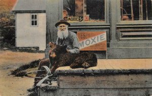 OLD MAN WITH BEAR & TRAP PORTLAND MAINE MOXIE MEDICAL ADVERTISING POSTCARD