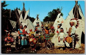 Vtg Indian Village Native American Teepee Headdress Men Women Children Postcard