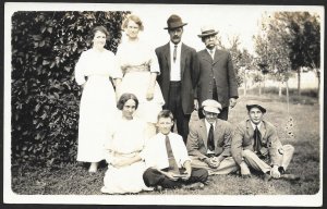 Group of Dressed up Men & Women by Trees RPPC Unused c1910s