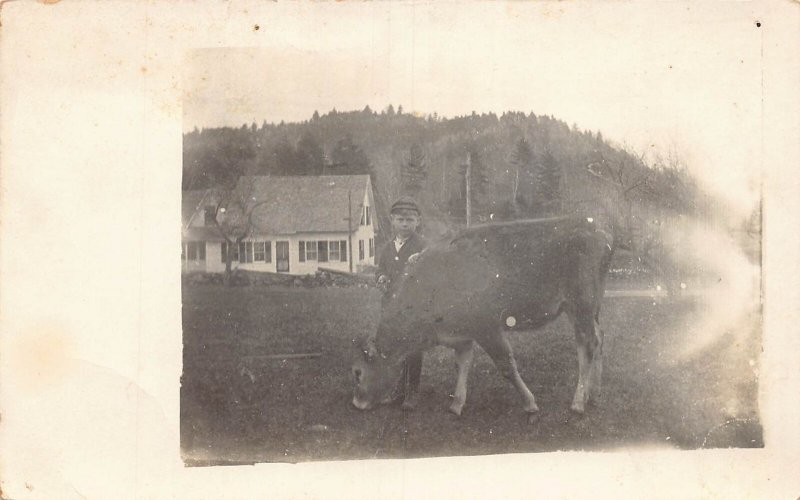 J86/ Interesting RPPC Postcard c1910 Boy Farmer Cow Home Farm 495