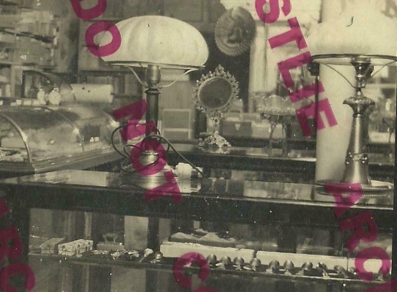 RPPC c1914 INTERIOR GENERAL STORE Books Lamps SILVERWARE Clocks JEWELRY