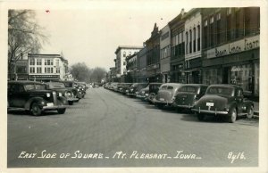 1940s Mt, Pleasant Iowa East Side Square occupation autos RPPC Postcard 25-10880
